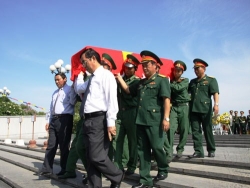 Lễ đón nhận và an táng hài cốt liệt sỹ quân tình nguyện và chuyên gia Việt Nam hy sinh tại Lào